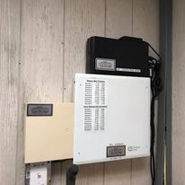 Wall-mounted business phone system with structured cabling